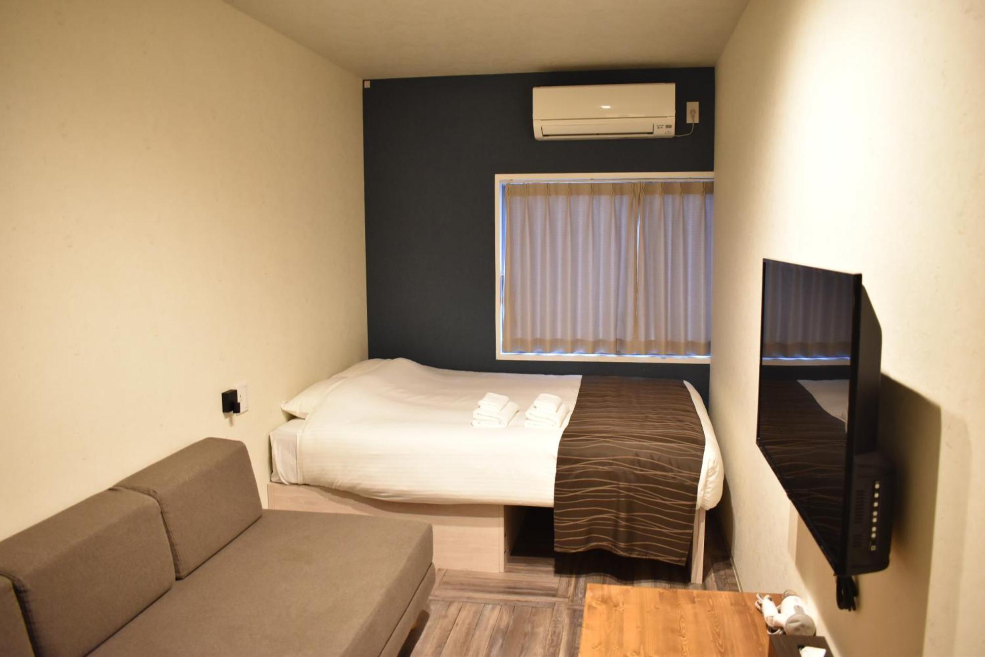 Shinsaibashi House Hotell Osaka Rum bild